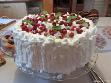 Cake decorated with freshly picked wild strawberries